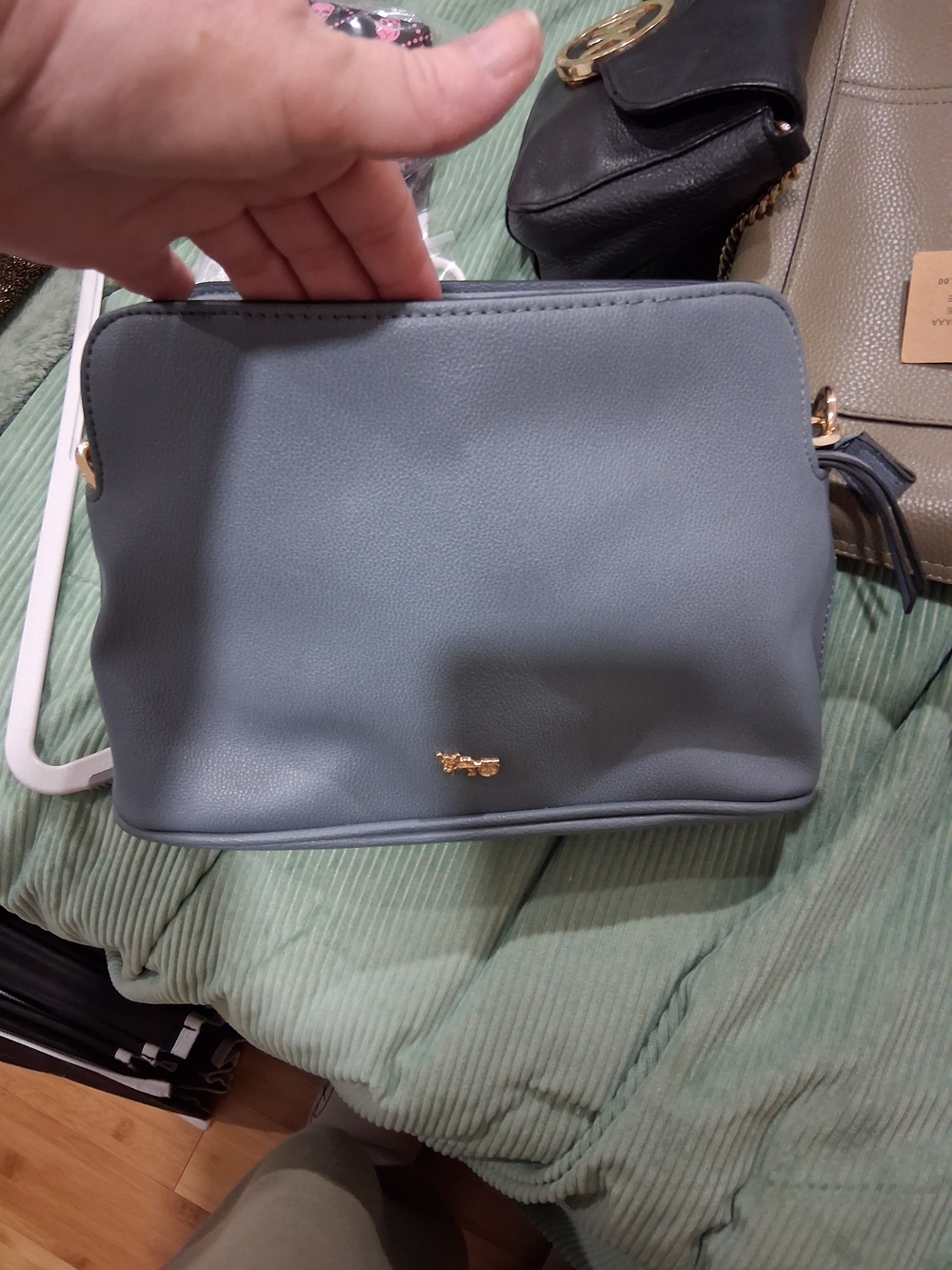 Small Pebbled Light Gray Crossbody Bag with Gold Accent